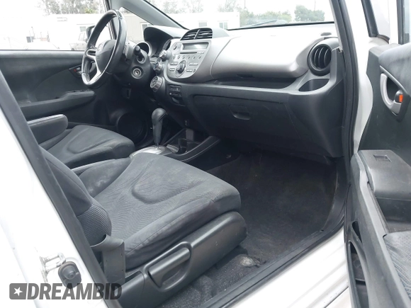 2009 Honda Fit Sport with VIN JHMGE88409S021730, listed as a IAAI auction lot 42045023 with 309,995 mi miles. Bid and sale history available at carsss.com. Image 5.