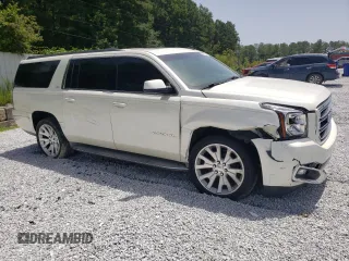 2015 GMC Yukon XL SLT with VIN 1GKS1HKC6FR167581, listed as a Copart auction lot 65600494 with 156,823 mi miles and Clean Title. Bid and sale history available at carsss.com. Image 4.