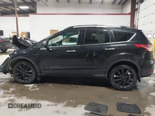 2015 Ford Escape SE with VIN 1FMCU9G91FUC49902, listed as a IAAI auction lot 41947883 with 140,670 mi miles. Bid and sale history available at carsss.com. Image 14.