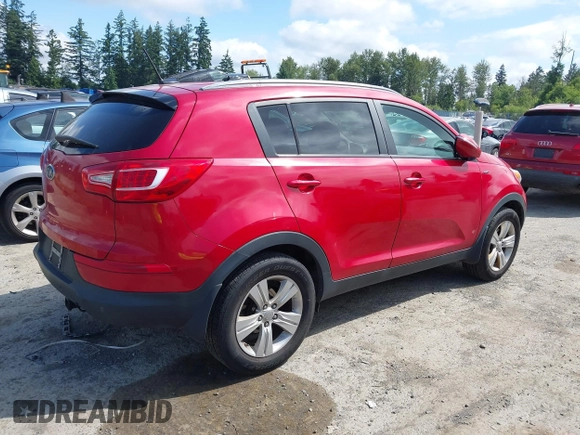 2011 Kia Sportage LX with VIN KNDPBCA20B7062048, listed as a IAAI auction lot 42583028 with 149,974 mi miles and . Bid and sale history available at DreamBid. Image 4.