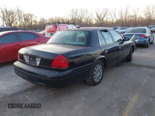 2001 Ford Crown Victoria Police Police Interceptor with VIN 2FAFP71W91X190763, listed as a IAAI auction lot 41781221 with 181,087 mi miles. Bid and sale history available at carsss.com. Image 4.
