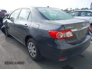 2011 Toyota Corolla L with VIN JTDBU4EE7B9162022, listed as a IAAI auction lot 42066643 with 124,384 mi miles. Bid and sale history available at carsss.com. Image 3.