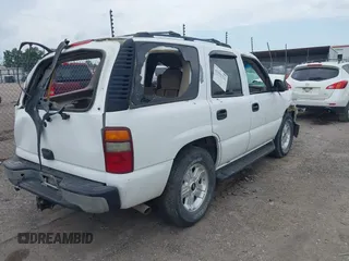 2002 Chevrolet Tahoe LT with VIN 1GNEC13Z52J341962, listed as a IAAI auction lot 42391522 with 239,452 mi miles and . Bid and sale history available at DreamBid. Image 4.