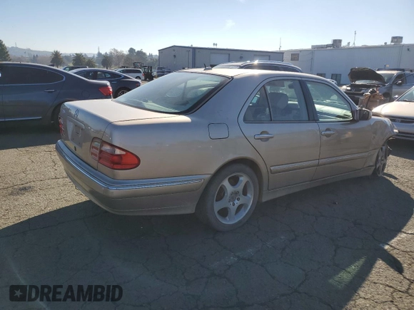 2001 Mercedes-Benz E-Class with VIN WDBJF70J91B263080, listed as a Copart auction lot 88094325 with 193,366 mi miles and Salvage Title. Bid and sale history available at carsss.com. Image 3.