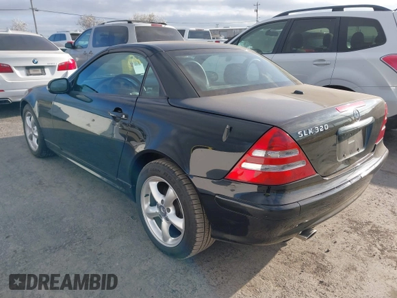 2002 Mercedes-Benz SLK 320 with VIN WDBKK65F02F241087, listed as a IAAI auction lot 41894441 with 100,232 mi miles and . Bid and sale history available at DreamBid. Image 3.