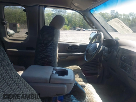 2003 Ford F-150 XL with VIN 1FTRX17W43NA77481, listed as a IAAI auction lot 42155310 with 230,322 mi miles. Bid and sale history available at carsss.com. Image 5.