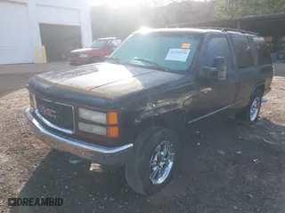 1997 Chevrolet Tahoe with VIN 1GNEK13R9VJ428657, listed as a IAAI auction lot 41324736 with 250,008 mi miles. Bid and sale history available at carsss.com. Image 2.