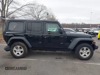 2022 Jeep Wrangler Unlimited Willys Sport with VIN 1C4HJXDN3NW132771, listed as a IAAI auction lot 41052274 with 33,302 mi miles and . Bid and sale history available at DreamBid. Image 13.