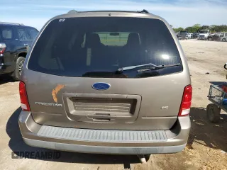 2006 Ford Freestar SE z VIN 2FMZA51696BA52749, wystawiony jako Copart lot #73174604 z przebiegiem 288 365 mil mil oraz Szkody całkowita. Historia ofert i sprzedaży dostępna na DreamBid. Obrazek 6.
