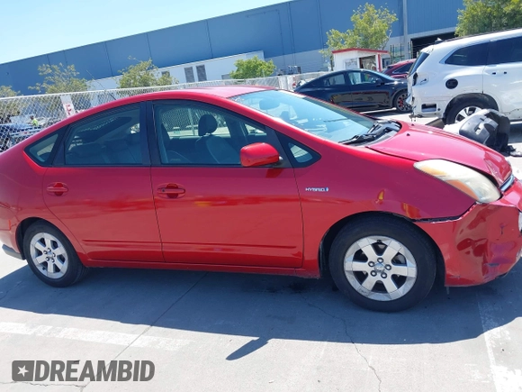 2007 Toyota Prius z VIN JTDKB20U373288946, wystawiony jako IAAI lot #42385536 z przebiegiem 133 336 mil mil oraz . Historia ofert i sprzedaży dostępna na DreamBid. Obrazek 13.