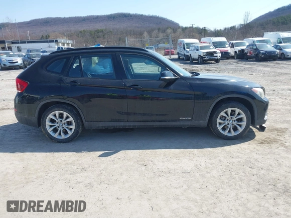 2013 BMW X1 xDrive28i with VIN WBAVL1C59DVR87469, listed as a IAAI auction lot 41775333 with 124,220 mi miles. Bid and sale history available at carsss.com. Image 13.