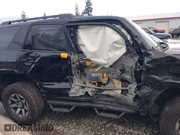 2022 Toyota 4Runner TRD Off Road Premium with VIN JTERU5JR8N6030756, listed as a IAAI auction lot 41612896 with 60,416 mi miles and . Bid and sale history available at DreamBid. Image 13.