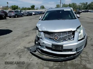 2012 Cadillac SRX Luxury Collection with VIN 3GYFNAE36CS653119, listed as a Copart auction lot 53866715 with 69,997 mi miles and Salvage Title. Bid and sale history available at DreamBid. Image 14.