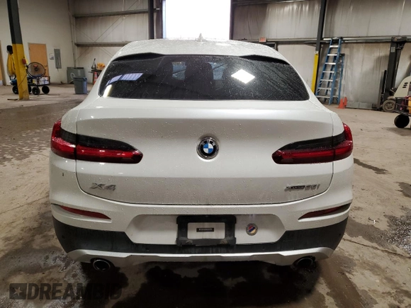 2020 BMW X4 xDrive30i with VIN 5UX2V1C0XLLZ32784, listed as a Copart auction lot 83619664 with Not provided miles and Salvage title. Bid and sale history available at DreamBid. Image 6.