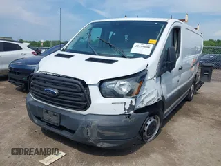 2016 Ford Transit Cargo with VIN 1FTYE1ZM6GKA84050, listed as a IAAI auction lot 42599008 with 135,943 mi miles and . Bid and sale history available at DreamBid. Image 17.