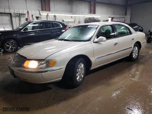2000 Lincoln Continental with VIN 1LNHM97V2YY760288, listed as a Copart auction lot 80894624 with 115,785 mi miles and Salvage Title. Bid and sale history available at carsss.com. Image 1.