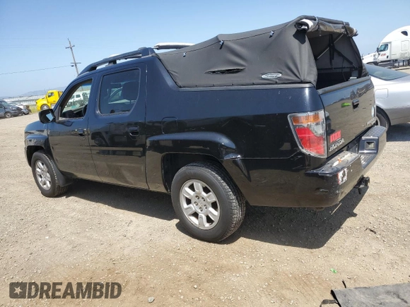 2006 Honda Ridgeline RTL with VIN 2HJYK16596H566552, listed as a Copart auction lot 57516525 with 192,023 mi miles and Salvage Title. Bid and sale history available at DreamBid. Image 3.
