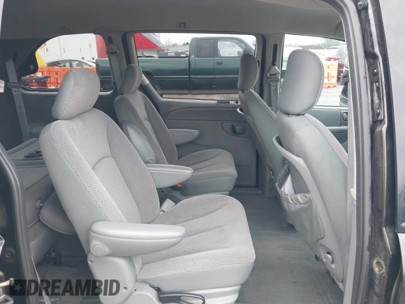 2007 Dodge Caravan SXT with VIN 1D4GP45R87B161237, listed as a IAAI auction lot 41594127 with 154,508 mi miles and . Bid and sale history available at DreamBid. Image 8.