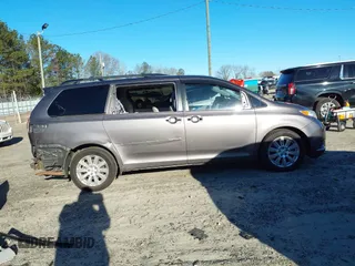 2011 Toyota Sienna XLE with VIN 5TDDK3DC8BS009739, listed as a IAAI auction lot 41638710 with 235,396 mi miles. Bid and sale history available at carsss.com. Image 13.