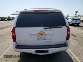 2014 Chevrolet Suburban LT with VIN 1GNSKJE79ER112840, listed as a Copart auction lot 64709074 with Not Provided miles and Salvage Title. Bid and sale history available at DreamBid. Image 6.
