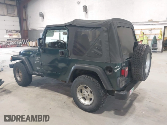 2000 Jeep Wrangler Sport with VIN 1J4FA49S2YP712526, listed as a IAAI auction lot 42151725 with 99,416 mi miles. Bid and sale history available at carsss.com. Image 3.
