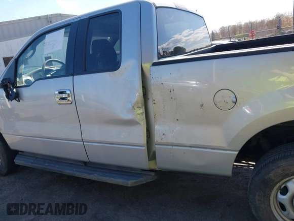 2005 Ford F-150 XLT with VIN 1FTPX145X5NA78866, listed as a IAAI auction lot 41898595 with 173,659 mi miles. Bid and sale history available at carsss.com. Image 14.
