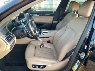 2017 BMW 7 Series 750i with VIN WBA7F0C57HGM21136, listed as a Copart auction lot 88525335 with 102,508 mi miles and Salvage title. Bid and sale history available at DreamBid. Image 7.