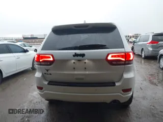 2018 Jeep Grand Cherokee Altitude with VIN 1C4RJFAG4JC320599, listed as a IAAI auction lot 42182661 with 70,957 mi miles and . Bid and sale history available at DreamBid. Image 16.
