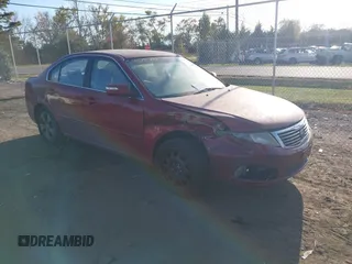 2009 Kia Optima LX z VIN KNAGE228995289603, wystawiony jako IAAI lot #40716738 z przebiegiem 209 904 mil mil oraz . Historia ofert i sprzedaży dostępna na DreamBid. Obrazek 1.