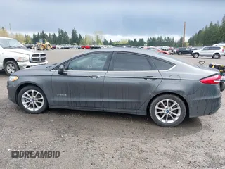 2019 Ford Fusion SE with VIN 3FA6P0LU6KR272193, listed as a IAAI auction lot 41993485 with 132,845 mi miles and . Bid and sale history available at DreamBid. Image 14.