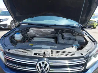 2013 Volkswagen Tiguan with VIN WVGCV3AX6DW605876, listed as a IAAI auction lot 42431619 with 106,279 mi miles and . Bid and sale history available at DreamBid. Image 10.