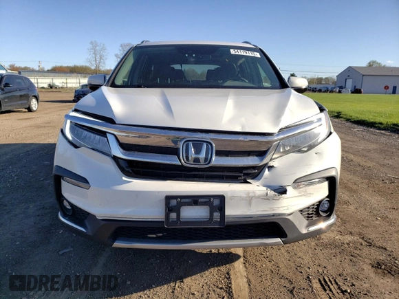 2021 Honda Pilot Elite with VIN 5FNYF6H05MB004870, listed as a Copart auction lot 54119115 with 99,491 mi miles and Salvage title. Bid and sale history available at DreamBid. Image 5.