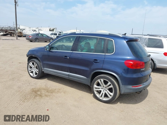 2012 Volkswagen Tiguan SEL with VIN WVGAV7AX8CW536752, listed as a IAAI auction lot 41798619 with 128,223 mi miles and . Bid and sale history available at DreamBid. Image 3.