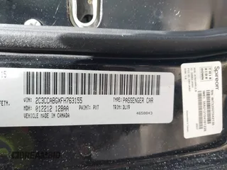 2015 Chrysler 300 with VIN 2C3CCABGXFH763155, listed as a IAAI auction lot 42213899 with 102,479 mi miles. Bid and sale history available at carsss.com. Image 9.