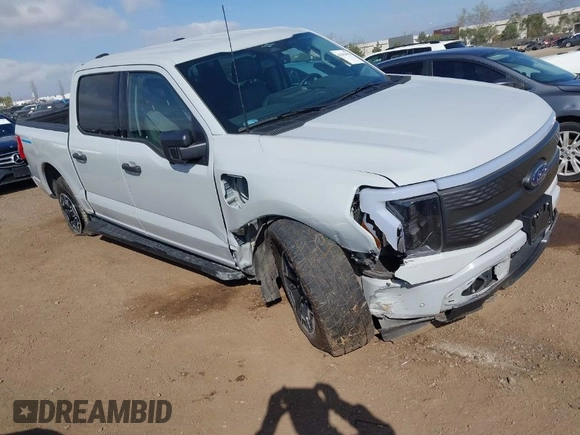 2023 Ford F-150 Lightning Pro z VIN 1FTVW1EL6PWG01336, wystawiony jako IAAI lot #41692903 z przebiegiem 39 085 mil mil oraz . Historia ofert i sprzedaży dostępna na DreamBid. Obrazek 1.