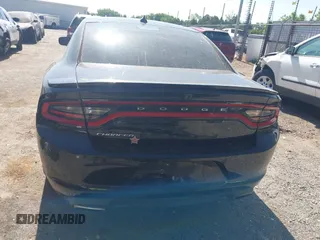 2015 Dodge Charger SXT with VIN 2C3CDXHG5FH928553, listed as a IAAI auction lot 42279342 with 129,402 mi miles and . Bid and sale history available at DreamBid. Image 17.