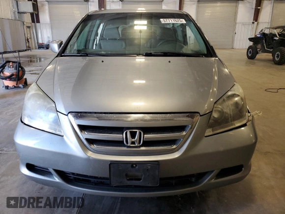 2007 Honda Odyssey EX с VIN 5FNRL38457B132819, выставлен на аукционе Copart как лот 57711625 с пробегом 265 463 миль миль и Списание • Salvage title. История ставок и продаж доступна на DreamBid. Изображение 5.