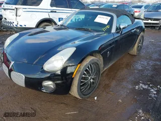 2008 Pontiac Solstice with VIN 1G2MC35B18Y116779, listed as a IAAI auction lot 41651726 with 65,898 mi miles. Bid and sale history available at carsss.com. Image 18.