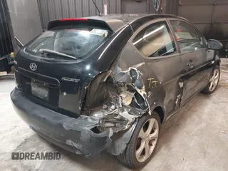 2007 Hyundai Accent SE with VIN KMHCN36C67U026540, listed as a IAAI auction lot 41062633 with 70,143 mi miles. Bid and sale history available at carsss.com. Image 4.