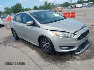 2015 Ford Focus SE z VIN 1FADP3F24FL273771, wystawiony jako IAAI lot #42771746 z przebiegiem 49 970 mil mil oraz . Historia ofert i sprzedaży dostępna na DreamBid. Obrazek 1.