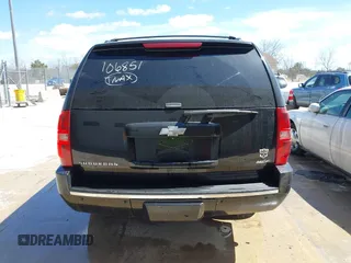 2010 Chevrolet Suburban LTZ with VIN 1GNUKKE39AR106851, listed as a IAAI auction lot 41994155 with 148,776 mi miles. Bid and sale history available at carsss.com. Image 16.