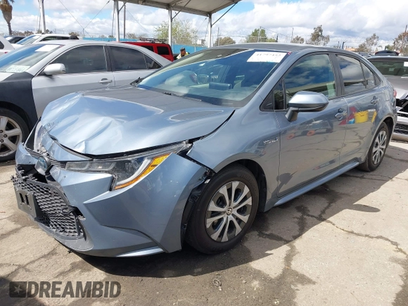 2021 Toyota Corolla Hybrid LE with VIN JTDEAMDE0MJ026601, listed as a IAAI auction lot 41797452 with 85,294 mi miles. Bid and sale history available at carsss.com. Image 17.