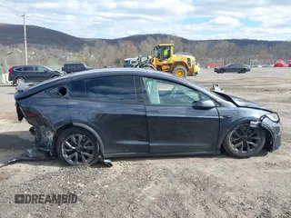 2023 Tesla Model X with VIN 7SAXCDE52PF425834, listed as a IAAI auction lot 41996298 with Not Provided miles and . Bid and sale history available at DreamBid. Image 12.