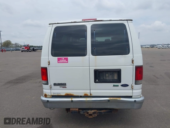 2010 Ford Econoline Passenger XL with VIN 1FBSS3BL1ADA74036, listed as a IAAI auction lot 42177046 with 205,186 mi miles. Bid and sale history available at carsss.com. Image 16.