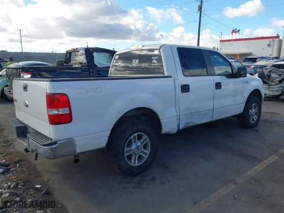 2007 Ford F-150 XLT with VIN 1FTPW14567KD58999, listed as a IAAI auction lot 40896476 with 210,997 mi miles. Bid and sale history available at carsss.com. Image 4.