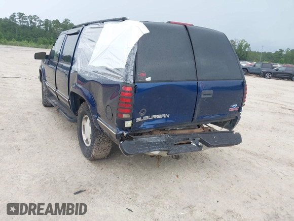 1999 GMC Suburban with VIN 3GKFK16R2XG501319, listed as a IAAI auction lot 42491117 with 231,561 mi miles and . Bid and sale history available at DreamBid. Image 3.