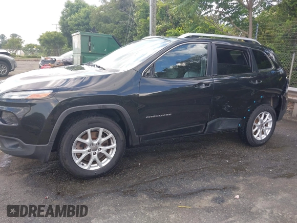 2015 Jeep Cherokee Latitude z VIN 1C4PJMCB4FW648897, wystawiony jako IAAI lot #42182493 z przebiegiem 129 457 mil mil oraz . Historia ofert i sprzedaży dostępna na DreamBid. Obrazek 6.