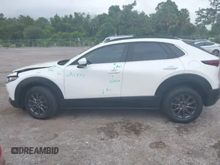 2023 Mazda CX-30 S with VIN 3MVDMBAM1PM511211, listed as a IAAI auction lot 42396707 with 49,469 mi miles and . Bid and sale history available at DreamBid. Image 14.