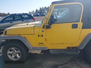 2005 Jeep Wrangler X with VIN 1J4FA39S25P374373, listed as a IAAI auction lot 41754017 with 195,156 mi miles. Bid and sale history available at carsss.com. Image 18.