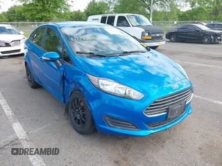 2015 Ford Fiesta SE z VIN 3FADP4BJ6FM125929, wystawiony jako IAAI lot #42181609 z przebiegiem 136 388 mil mil oraz . Historia ofert i sprzedaży dostępna na DreamBid. Obrazek 1.